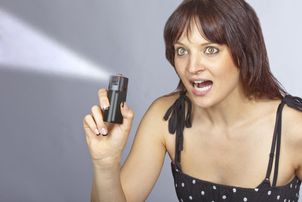 Lady using a spray can for self defence